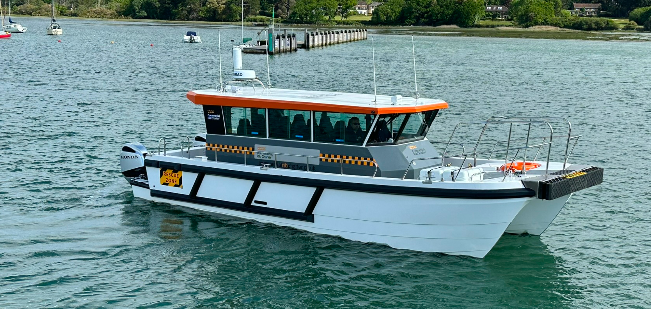CRC Hunter commercial catamaran workboat underway showing its open foredeck and rescue zone