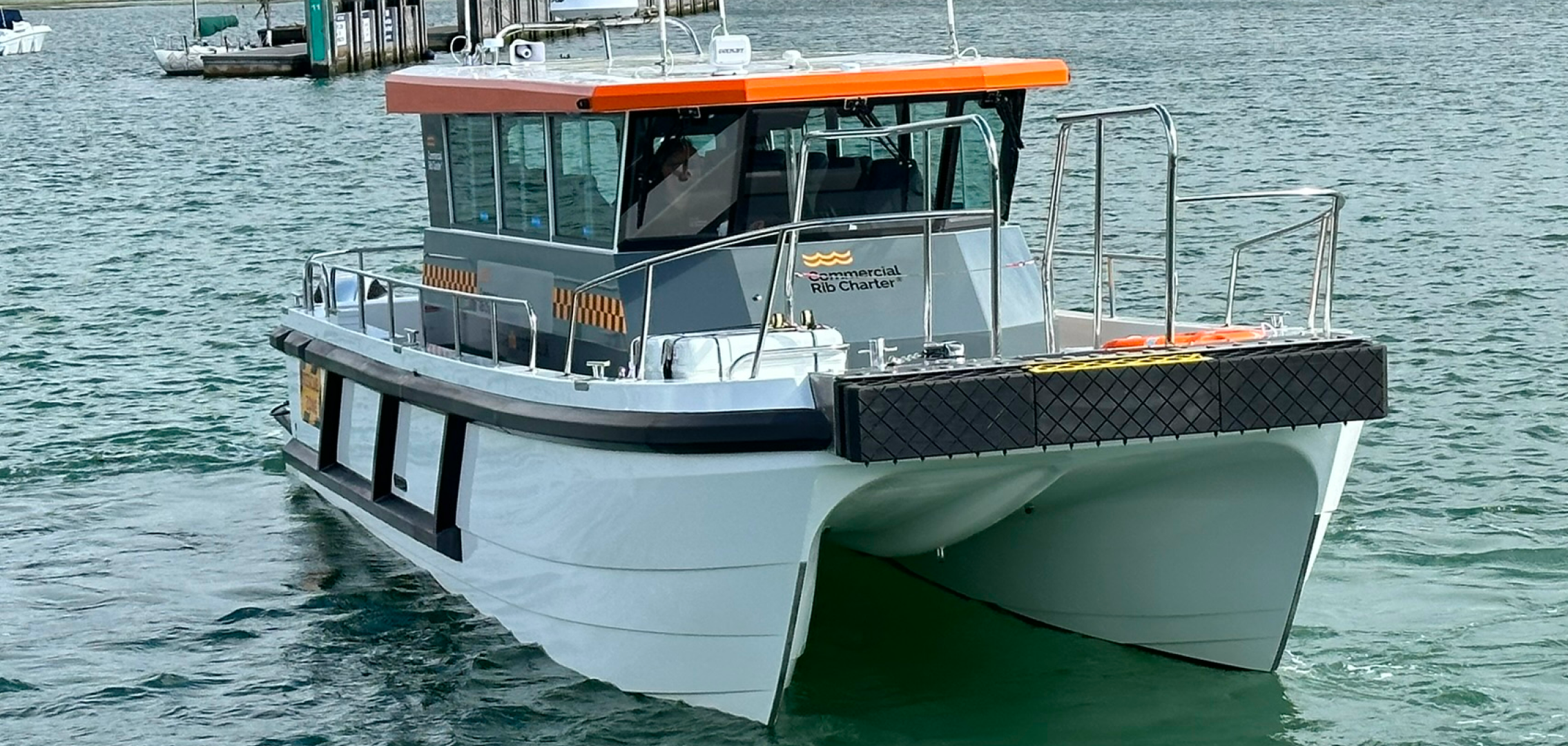 Front view of CRC Hunter commercial catamaran workboat underway